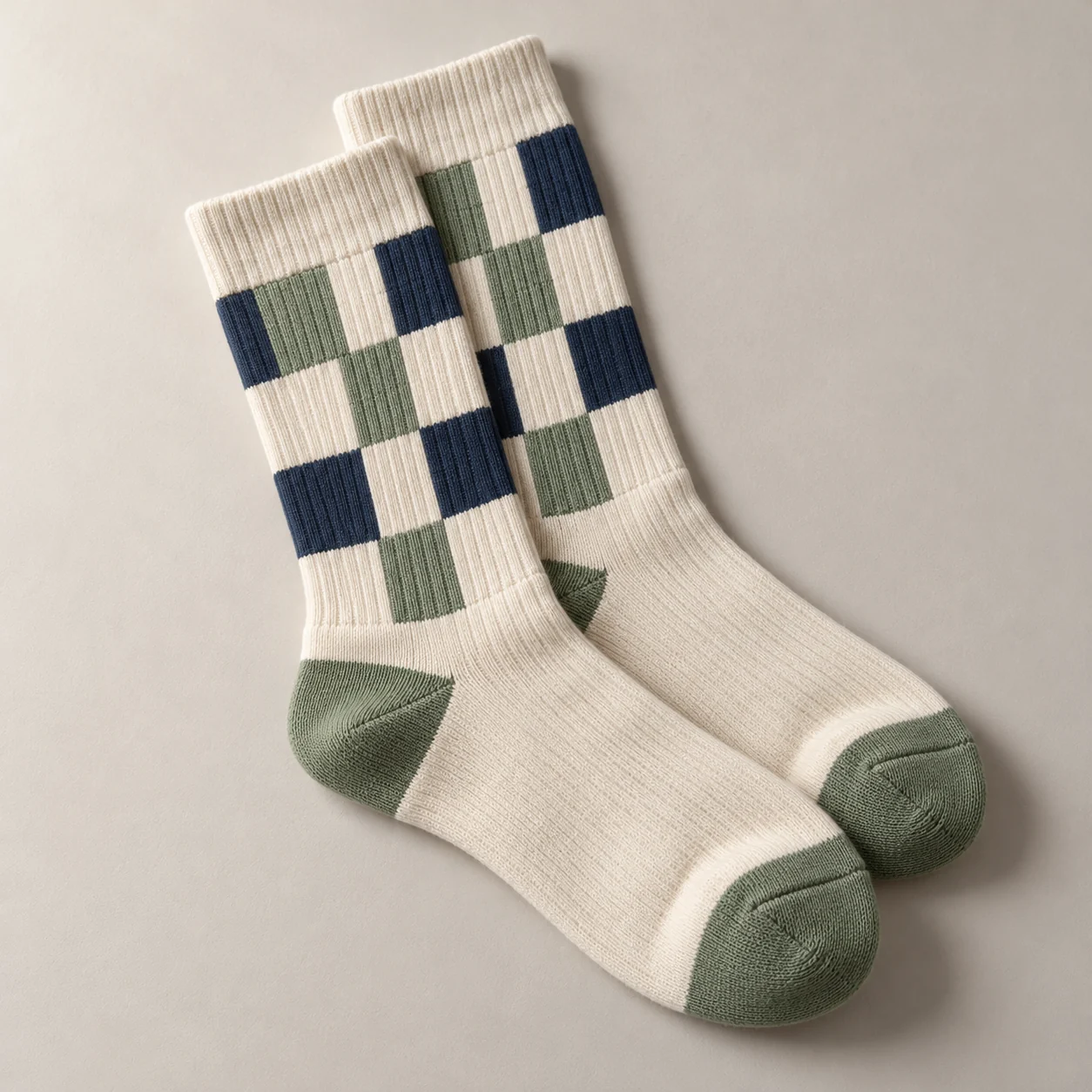 Cream crew sock concept with a navy and sage checker design